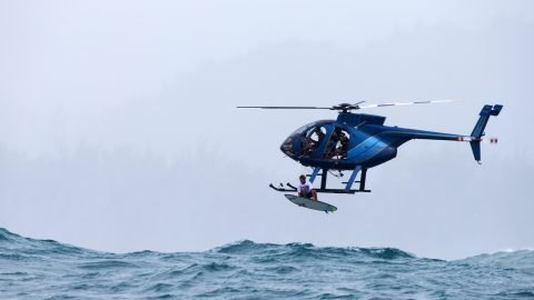 Nathan Fletcher jumps out of helicopter to ride the waves